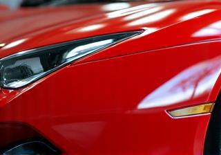 Car with mirror-like ceramic coating finish.