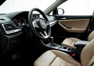 Clean car interior showing dashboard and seats.